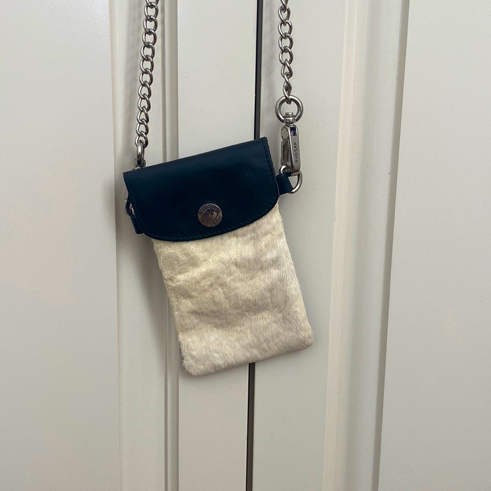Rudsak money satchel.  Black leather and beige cowhide.